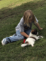 girl with puppy