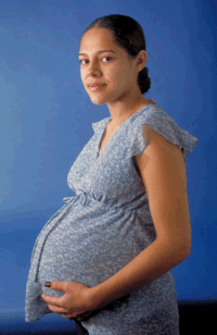 picture of a pregnant female wearing blue blouse